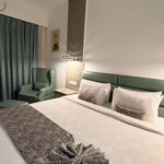 Modern bedroom in The cottage Room at Aarian Woods Resort