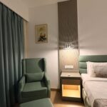 Modern bedroom in The cottage Room at Aarian Woods Resort
